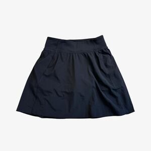 Tnaction black mini skirt pleated tennis skort (has built in shorts) - size XS